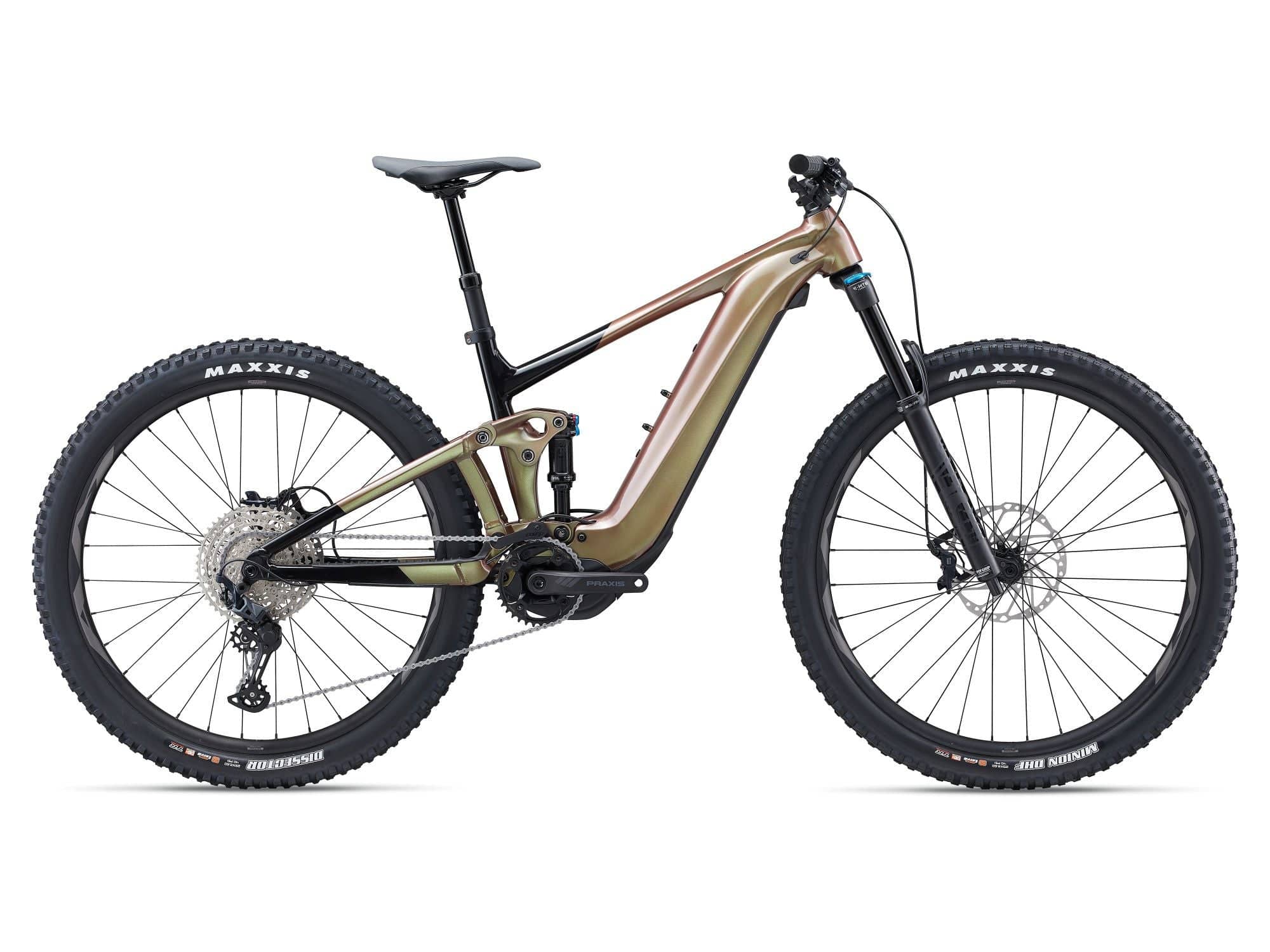 Giant Trance X E+ 2 2023 electric mountain bike with Shimano SLX M7100 drivetrain, featuring a sturdy frame and mountain bike tires.