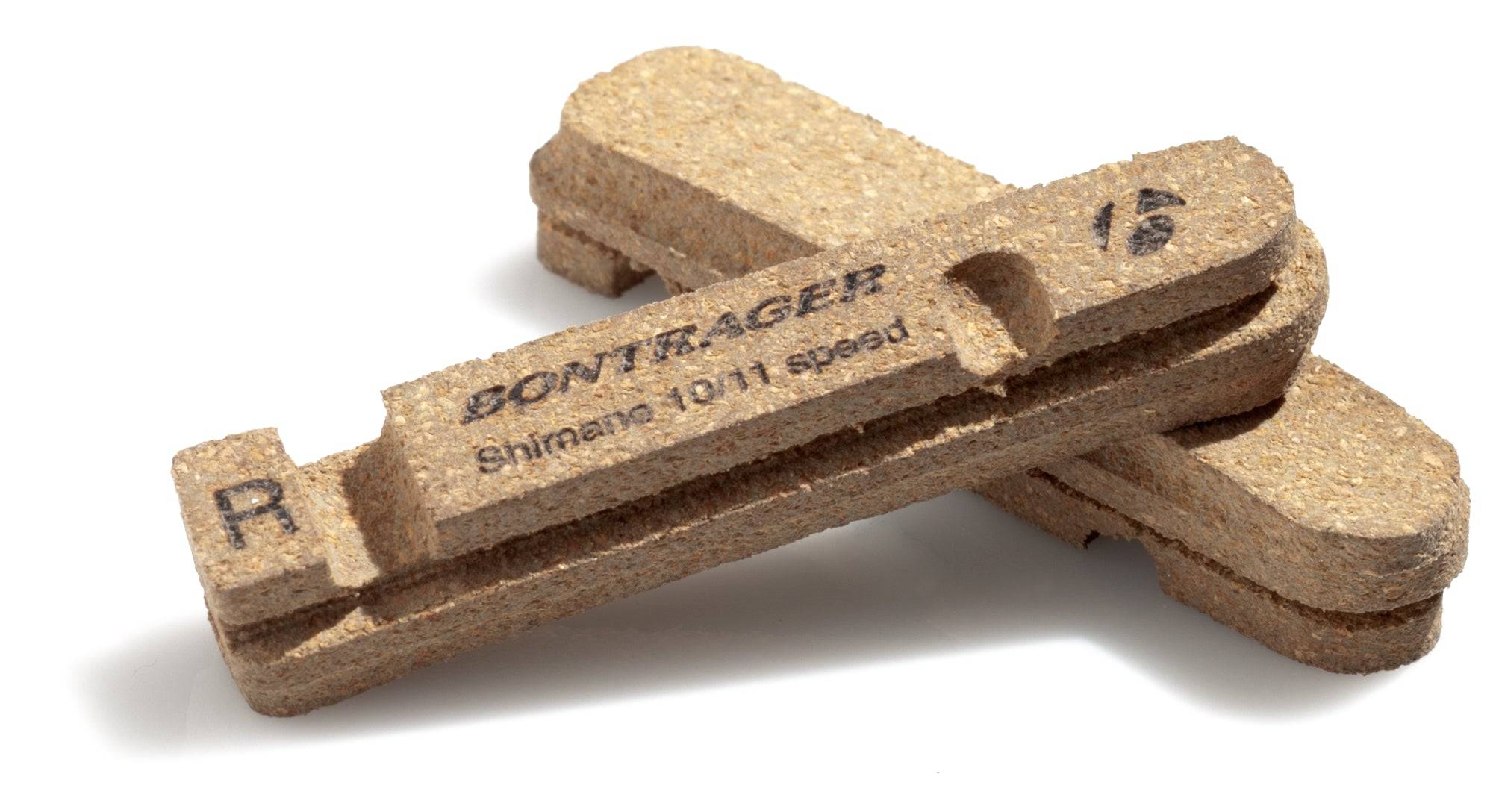 Bontrager Carbon Stop Cork brake pads for Shimano 2-slot carbon rims, shown installed on bicycle brake system.