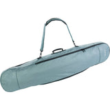 EVOC Steel 50L snowboard travel bag with padded interior for boards up to 165cm, designed for easy carrying and protection.