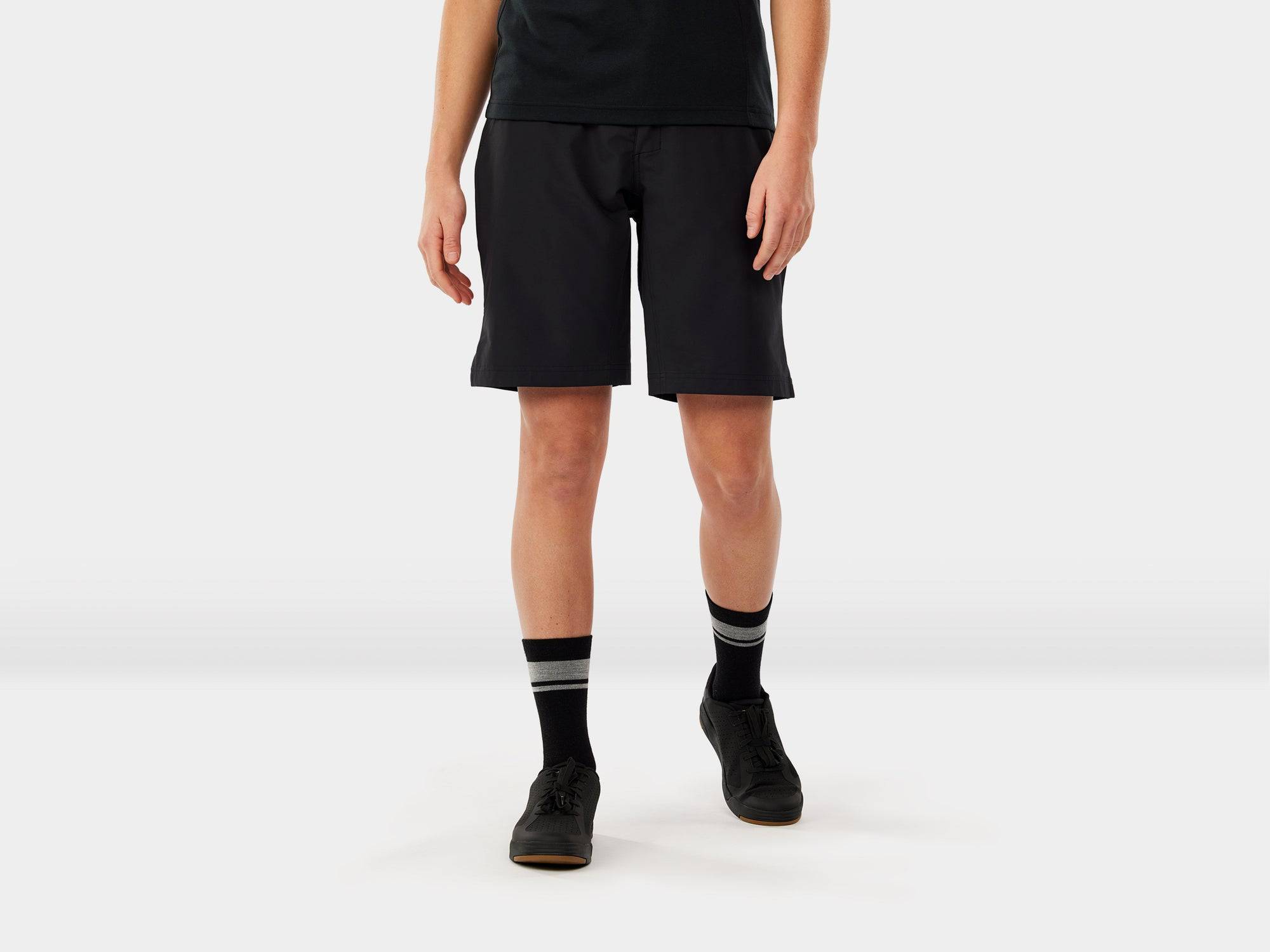 Trek Evoke women's mountain bike shorts with padded comfort for trail riding, shown in black with adjustable waistband.