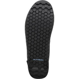 Shimano GF4 gravel shoes with ULTREAD® grip for flat pedals, showing black cycling shoes with textured soles and branding details.