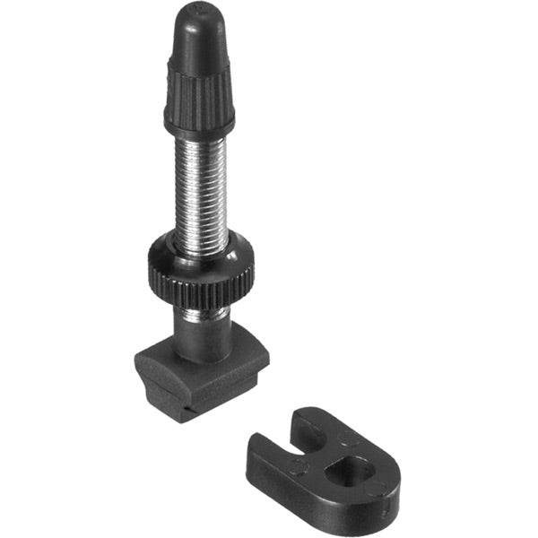 DT Swiss brass tubeless valve for MTB wheels, designed for compatibility with MTB rims, shown installed on a mountain bike wheel.