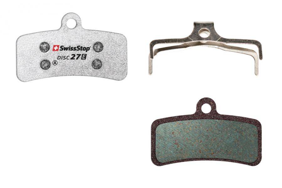 SwissStop Disc 27 brake pads for Shimano MTB ZEE, ZE, M8020 silver disc brake system, showing the copper-colored pads and packaging.