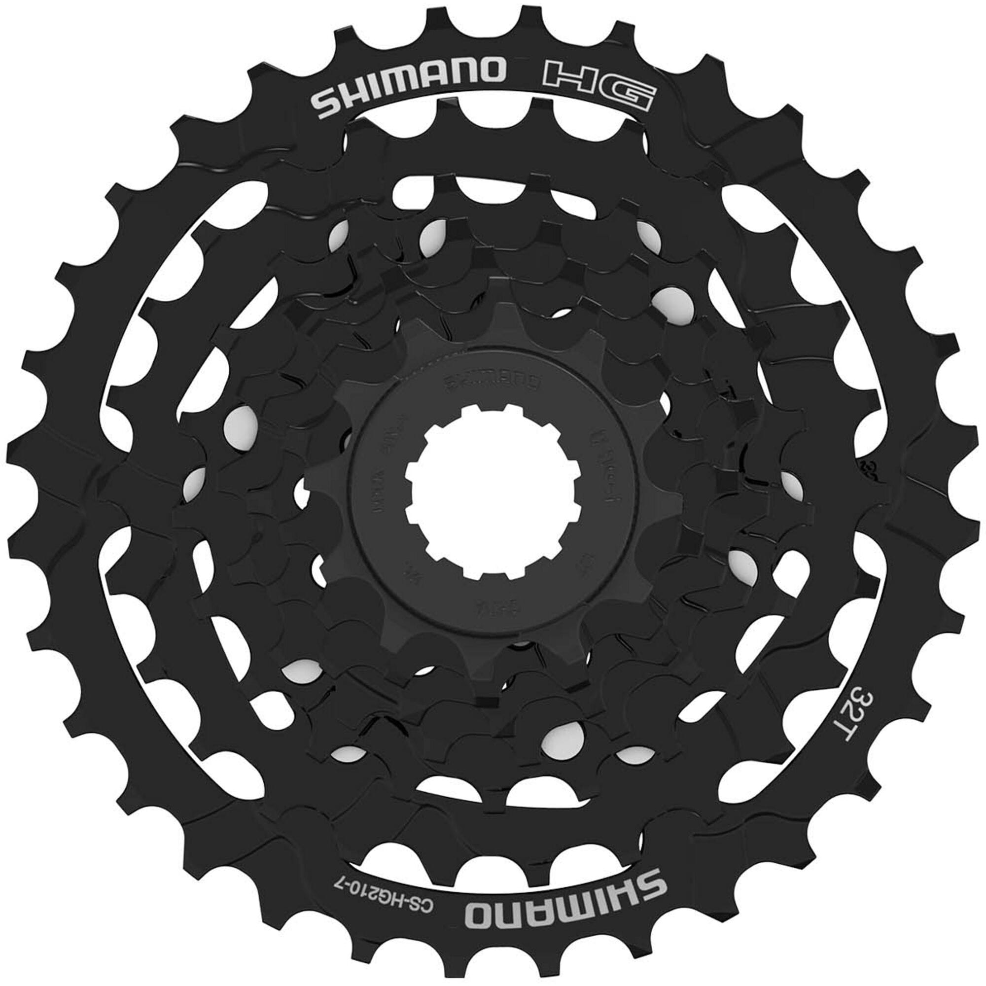 Shimano Tourney CS-HG210 7-speed bicycle cassette with 12-32T gears, showing silver sprockets and gear teeth for smooth shifting.