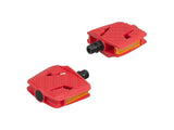 Trek Kids' small flat platform pedals for children’s bikes, durable bike components with non-slip surface, black color.