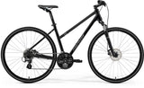 Merida Crossway 10 women's hybrid bike with Shimano Acera gears and disc brakes, suited for commuting and outdoor riding.