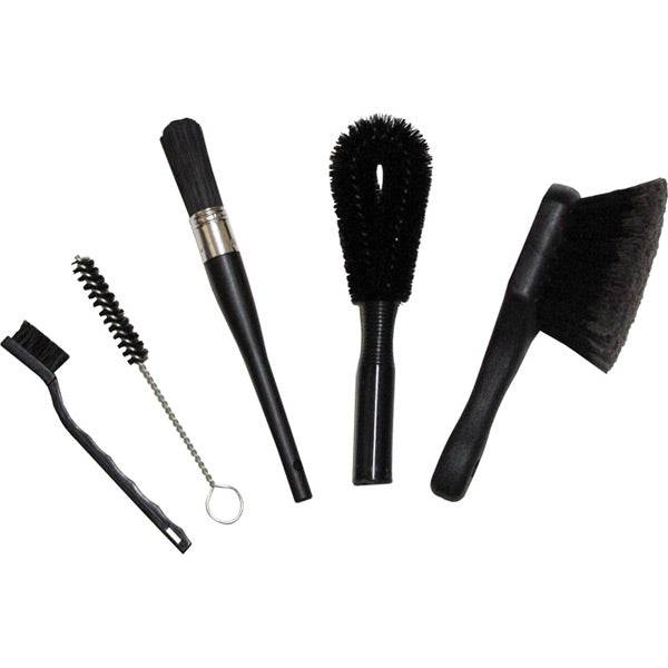 Finish Line Easy Pro Brush Set with five cleaning brushes for bikes, motorcycles, and cars in a workshop setting.