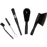 Finish Line Easy Pro Brush Set with five cleaning brushes for bikes, motorcycles, and cars in a workshop setting.
