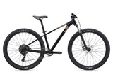 Liv Tempt 4 trail mountain bike with ALUXX aluminum frame and 27.5-inch or 29-inch wheels, ready for off-road adventures