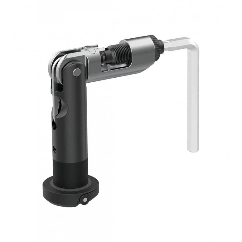 Topeak Plug n Chain Tool 13s black compact MTB chain repair tool for 13-speed chains, shown on a workshop workbench.
