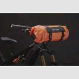 Aeroe Spider Handlebar Cradle bike mount with extra gear capacity, showing the black cradle attached to a bicycle handlebar.