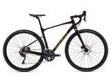 Giant Revolt 1 2024 gravel bike with Shimano GRX 400 disc brakes, black frame, and knobby tires for off-road riding.
