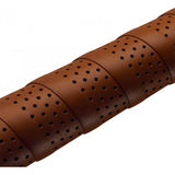Brooks leather bike handlebar tape with perforated natural leather grip wrap for comfortable cycling control.