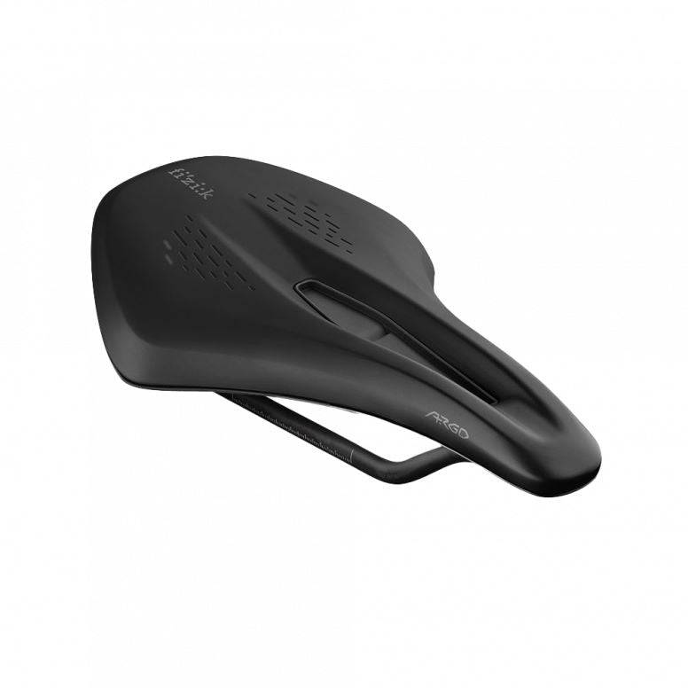 Fizik Terra Argo X1 gravel bike saddle with ergonomic cut-out and carbon rails, designed for comfort and lightweight performance.