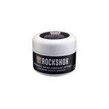 RockShox Dynamic Seal Grease 500ml for rear shock service, showing a container of heavy-duty grease for mountain bike maintenance.