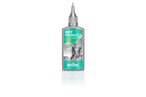 Motorex Wet Protect biodegradable bike chain lubricant in silver and green container, workshop use, 5-liter size.