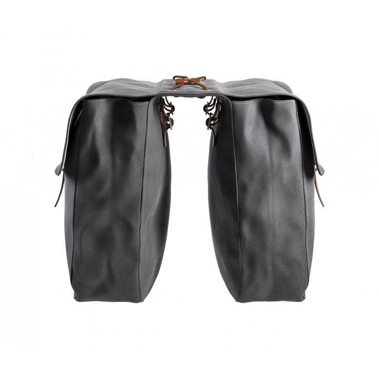 Brooks Brick Lane vintage-inspired water-resistant bike panniers set attached to bicycle racks, showing durable design and classic style.