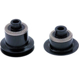 DT Swiss rear wheel conversion kit with 135mm quick release for 11-speed road bikes, showcasing the components and axle hardware.