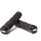 ODI Yeti Hard Core MTB lock-on grips in black with snap cap end plugs, designed for mountain biking handlebars.