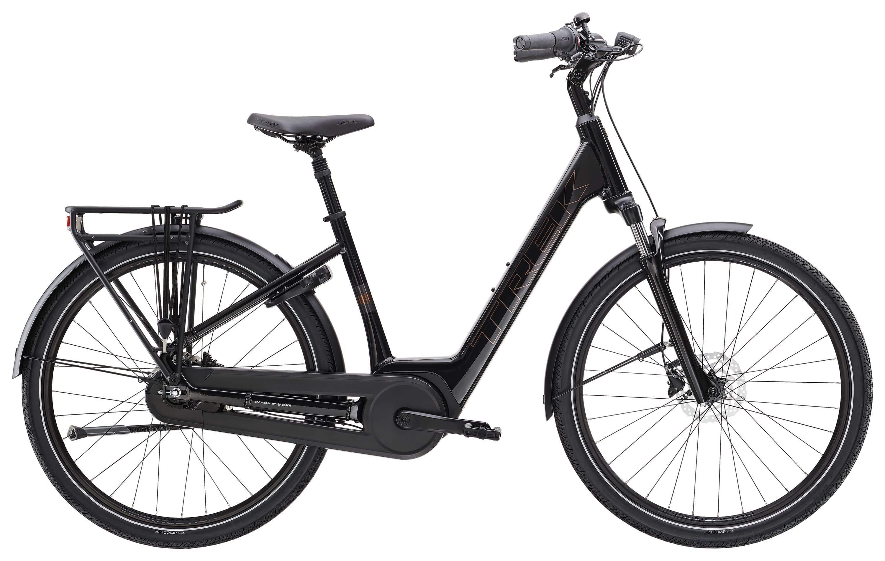 Trek District+ 2 Lowstep electric hybrid bike for urban commuting, featuring a sleek frame and electric motor for city travel.
