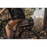 Topeak Tetrarack M2 HD black rear bike rack with QuickTrack system mounted on a bicycle for carrying cargo.