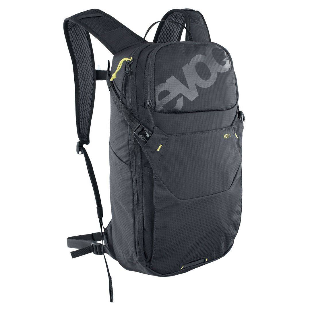 EVOC Ride Performance 12L cycling backpack with hydration system, helmet flap, and adjustable straps for bike riding.