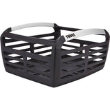 Thule Pack'n Pedal bike basket attached to a bike rack, designed for urban commuters with Thule or standard pannier racks.