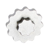 UNIOR metal crank cap tool for Shimano Hollowtech II with magnetic storage, used in bicycle workshop maintenance.