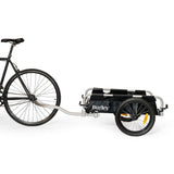 Burley Flatbed Cargo Bike Trailer, foldable two-wheel accessory with spacious platform for bulk hauling, shown with cargo.