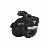Topeak Aero Wedge Quickclick Bike Seat Pack with pump holder and reflective strip attached to a bike saddle.