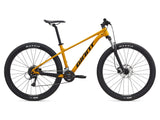 Giant Talon 29 3 mountain bike with Shimano Acera 1x drivetrain and front suspension, ready for trail riding in rugged terrain.