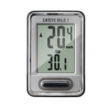 CatEye Velo 7 wired cycle computer in grey showing speed, distance, and time tracking on a bicycle handlebar.