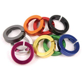 ODI Lock Jaw Clamps with Snap Caps for Lock-On Grip System, MTB BMX ATV components, showing the clamps and caps in black.