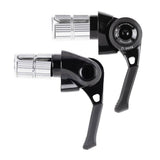 MicroSHIFT road bike bar end shifters with index and friction modes mounted on drop handlebars.