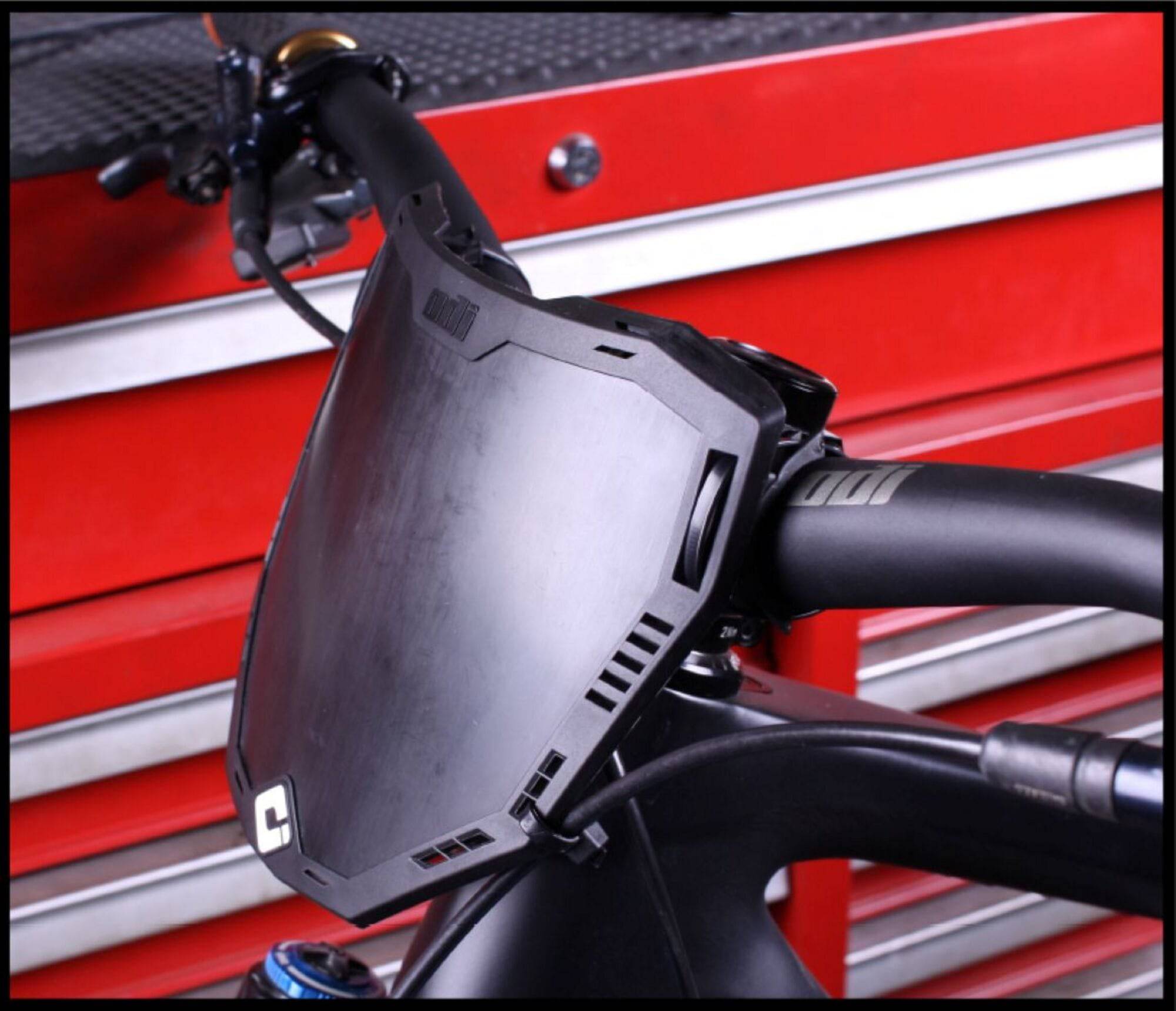 ODI Universal Enduro Bike Number Plate with adjustable offset mounting system, durable components for motorcycle customization.