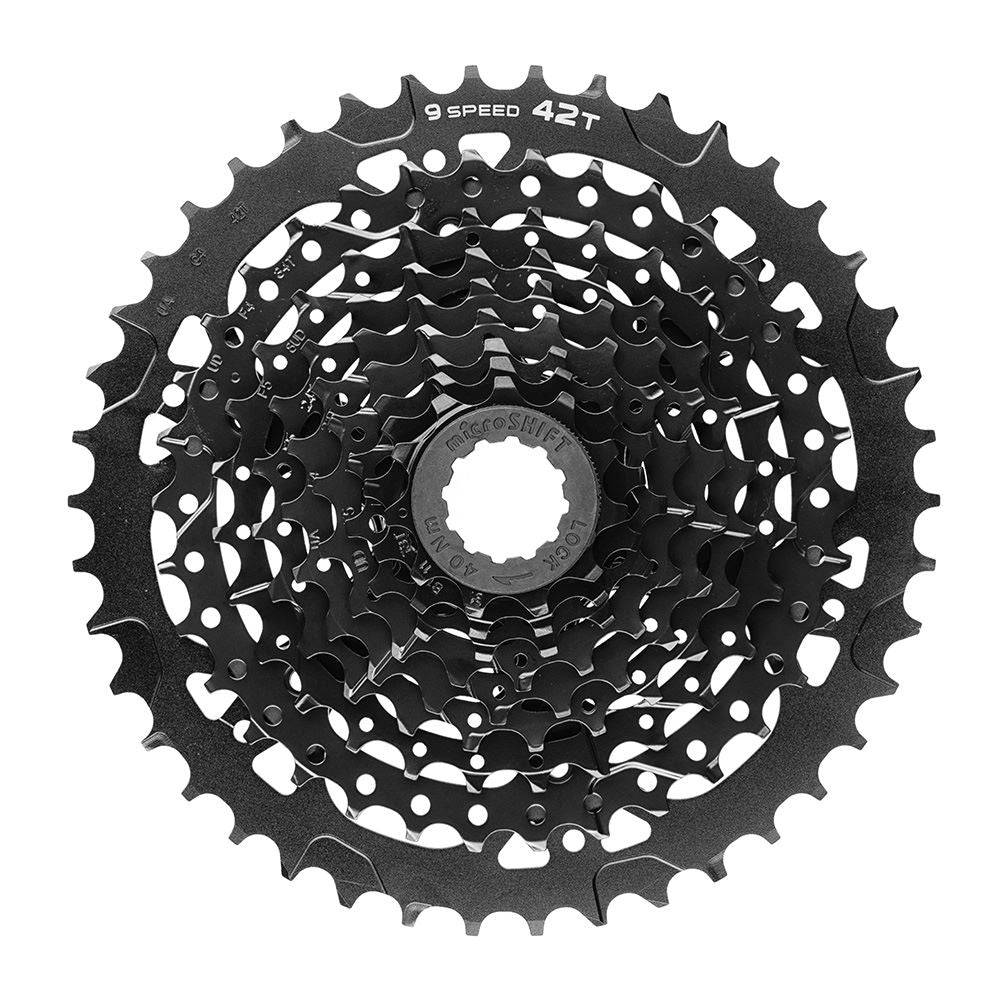 MicroSHIFT Advent H-Series 9-speed alloy cassette with 11-42T gear range for HG hubs, shown on a bike drivetrain.