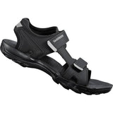 Shimano SD5 unisex SPD mountain biking shoes showing black and gray design with clipless pedal compatibility.