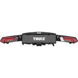 Thule Epos 2-bike towball carrier with 13-pin connector, designed for secure bike transport on vehicle hitch.
