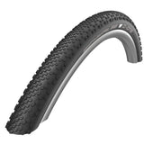 Schwalbe G-One Bite Evo gravel tire with tubeless-ready design, showcasing its tread pattern and durable sidewalls for off-road riding.