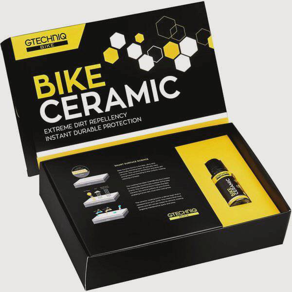 Gtechniq Bike Ceramic Kit workshop image showing application of durable 24-month protective coating on a motorcycle.