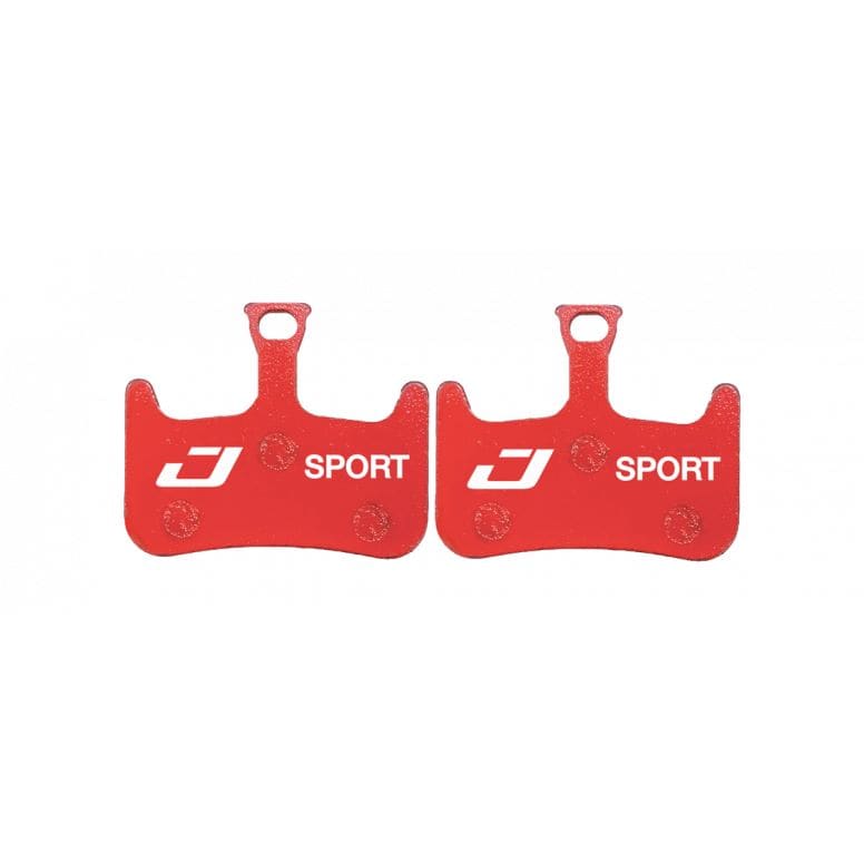 Jagwire Sport Semi-Metallic Disc Brake Pads for Hayes Dominion A2 and T2 mountain bike brakes, close-up of brake pad components.