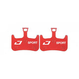 Jagwire Sport Semi-Metallic Disc Brake Pads for Hayes Dominion A2 and T2 mountain bike brakes, close-up of brake pad components.