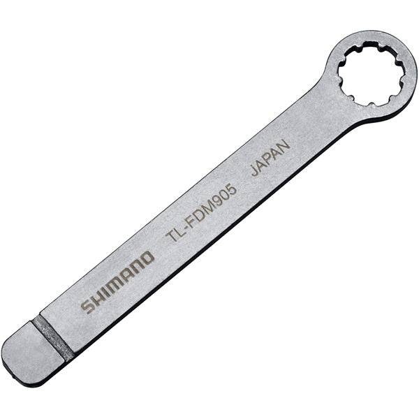 Shimano TL-FDM905 chain guide assembly tool for precise workshop use, shown in a workshop setting with tool components visible.