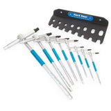 Park Tool THH-1 sliding T-handle hex wrench set for bicycle maintenance, 2-10mm, with black handles on a workshop workbench.