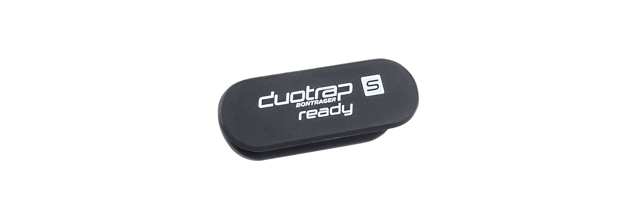 Black Bontrager DuoTrap S cover installed on Trek Domane carbon road bike frame's seat stay, part of bike components.