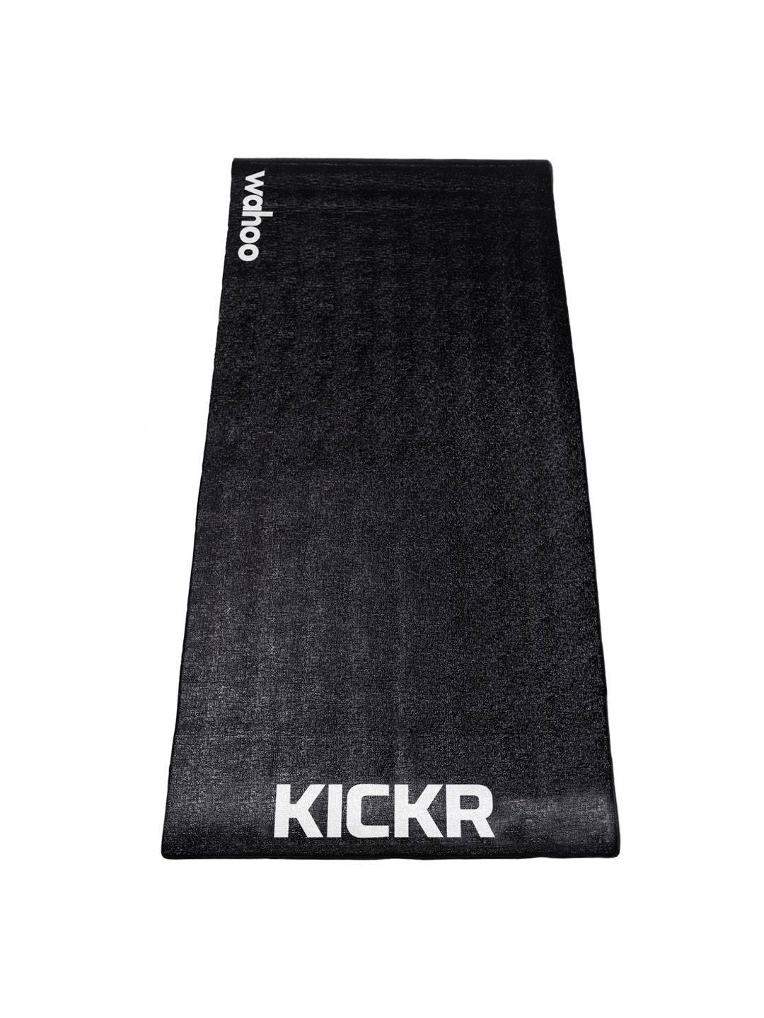 WAHOO KICKR Trainer Floormat for indoor cycling, floor protection and noise reduction, shown under a WAHOO trainer on a gym floor.