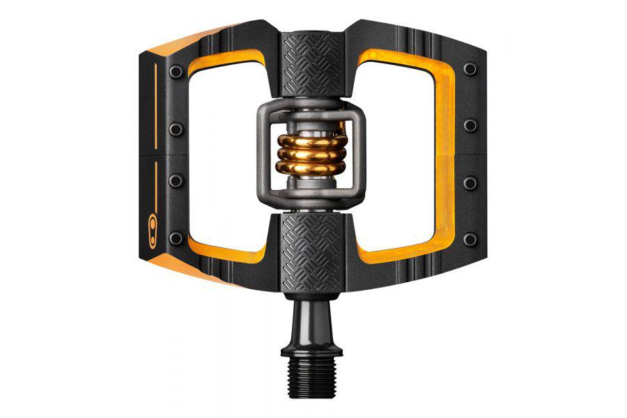 Crankbrothers Mallet DH 11 downhill pedals in black and gold with adjustable release angle and durable metal construction.
