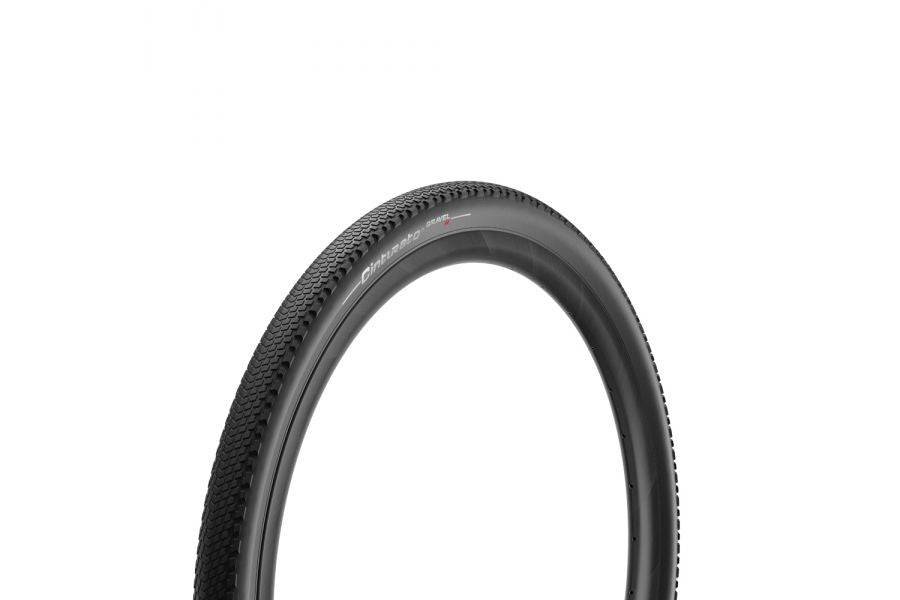 Pirelli Cinturato Gravel H tubeless-ready tyre with SpeedGRIP compound, designed for hard gravel terrain, showing tread pattern and sidewall.