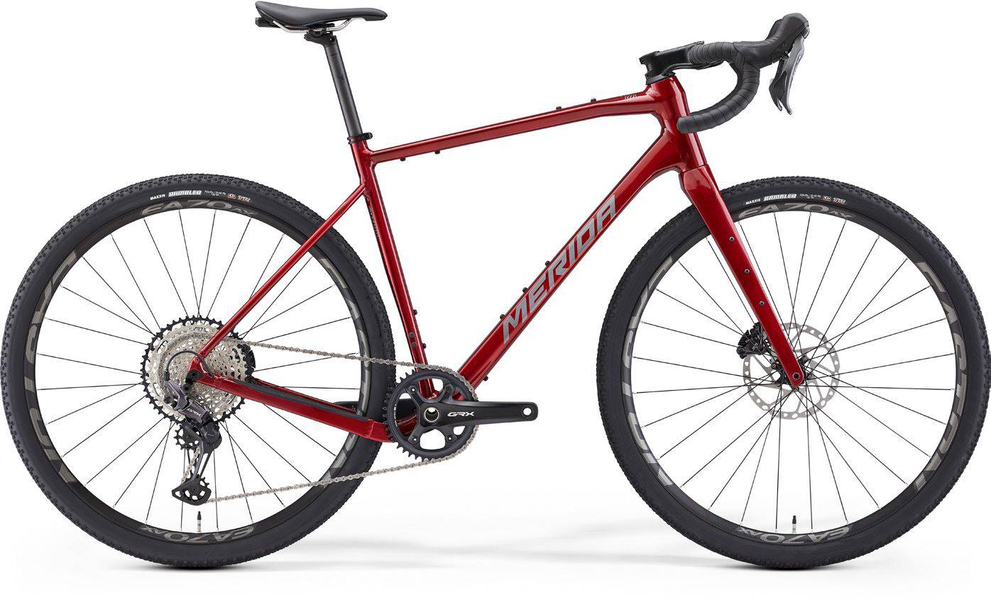 Merida Silex 700 gravel bike with hydraulic disc brakes and MTB-inspired geometry, shown in a sleek design.