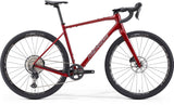 Merida Silex 700 gravel bike with hydraulic disc brakes and MTB-inspired geometry, shown in a sleek design.